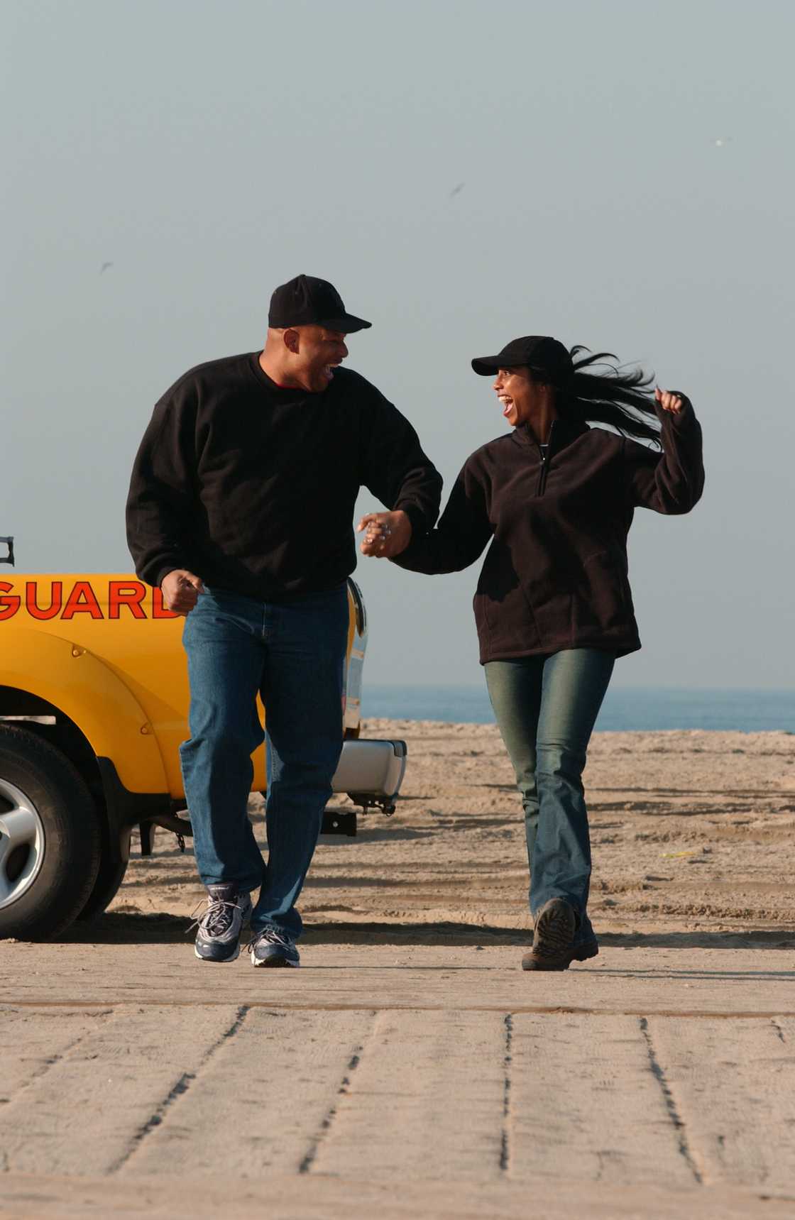 Chip McAllister and Kim McAllister take off from the Santa Monica Pier in Los Angeles