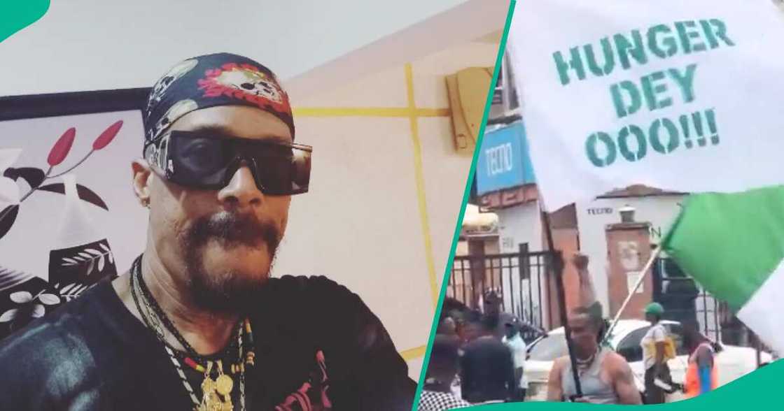 Hank Anuku takes to streets to protest hunger with 'Hunger Dey O' flag. Hank Anuku takes to streets to protest hunger with 'Hunger Dey O' flag.