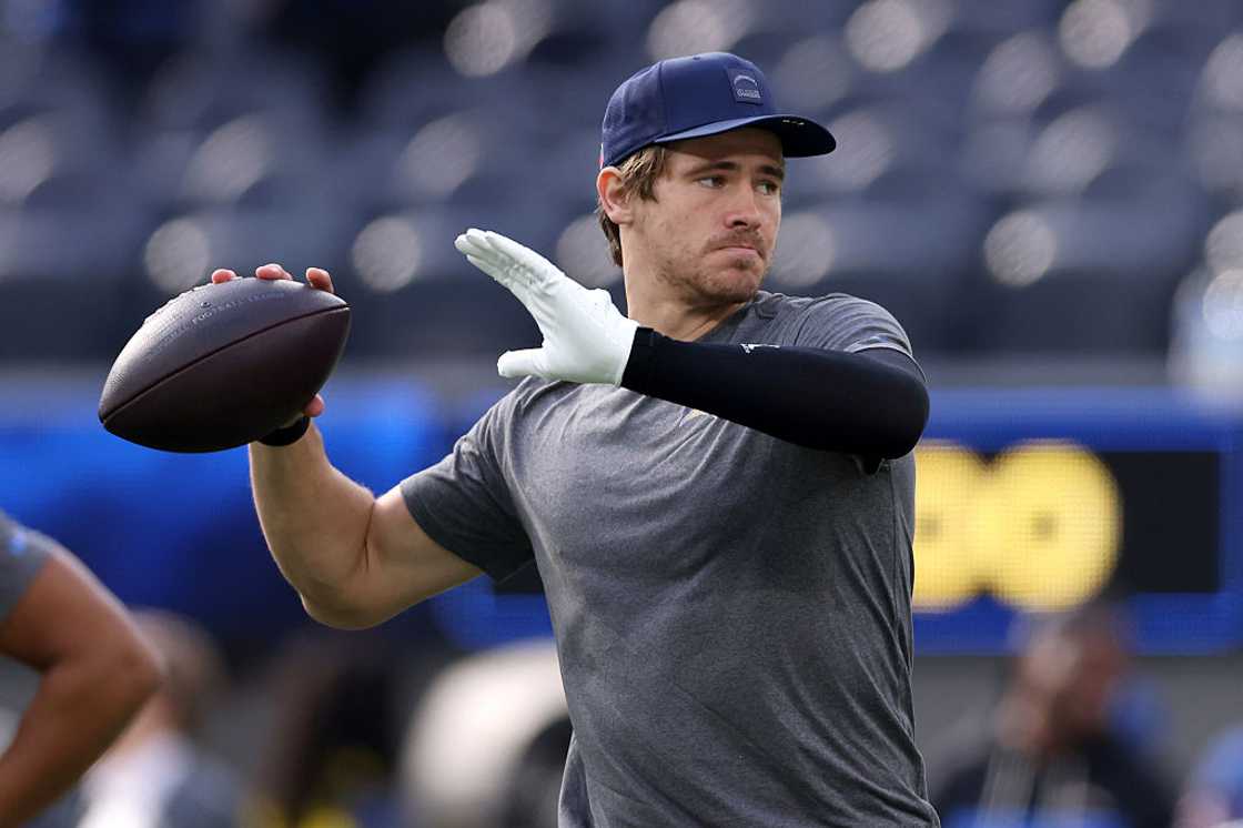 Justin Herbert trains before a game Justin Herbert trains before a game