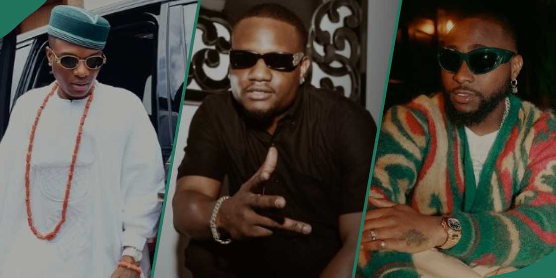 Singers Wizkid and Davido with DJ Tunez