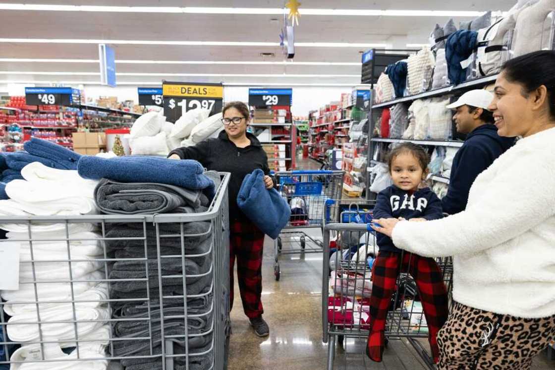 Walmart reported solid earnings, but said consumers are still strapped for cash due to persistent inflation
