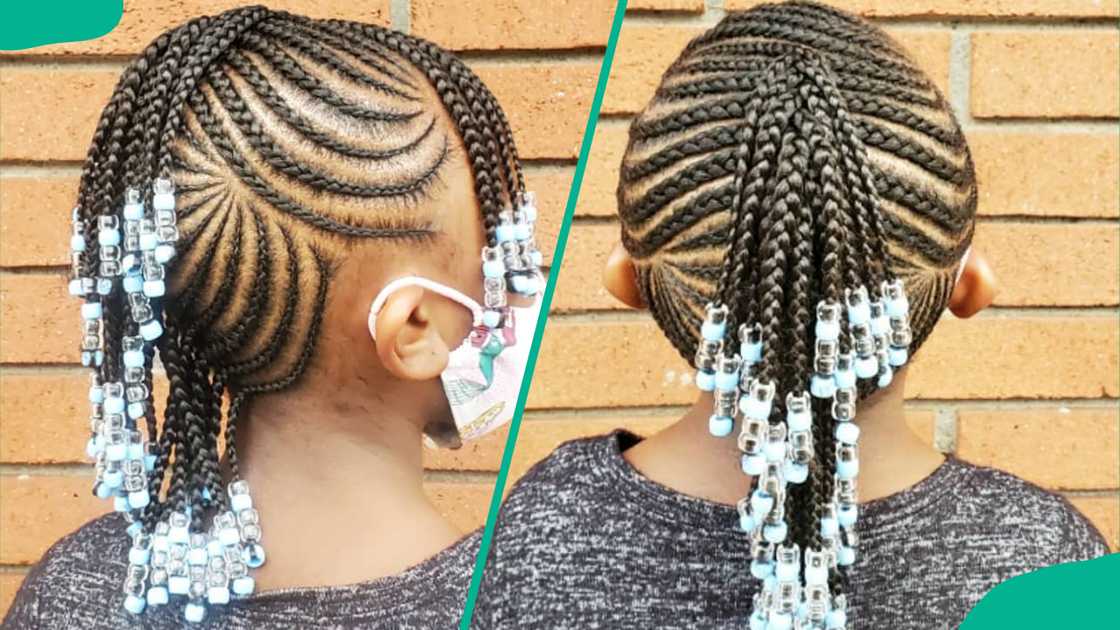 A girl wearing Mohawk-styled cornrows A girl wearing Mohawk-styled cornrows