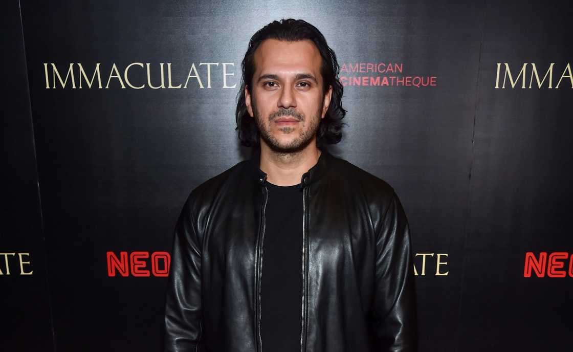 Jonathan Davino poses connected  the reddish  carpet of the 2024 Los Angeles premiere screening of Immaculate