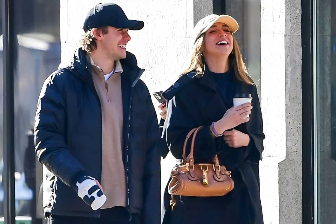 Tate McRae and Jack Hughes share a chat while on a walk.