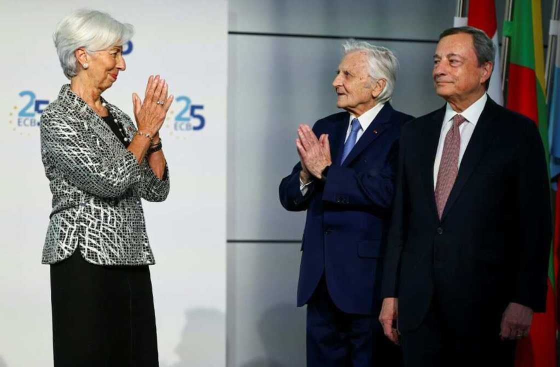 ECB President Christine Lagarde, left, welcomes her predecessors Jean-Claude Trichet and Mario Draghi for the 25th anniversary celebrations on Wednesday ECB President Christine Lagarde, left, welcomes her predecessors Jean-Claude Trichet and Mario Draghi for the 25th anniversary celebrations on Wednesday