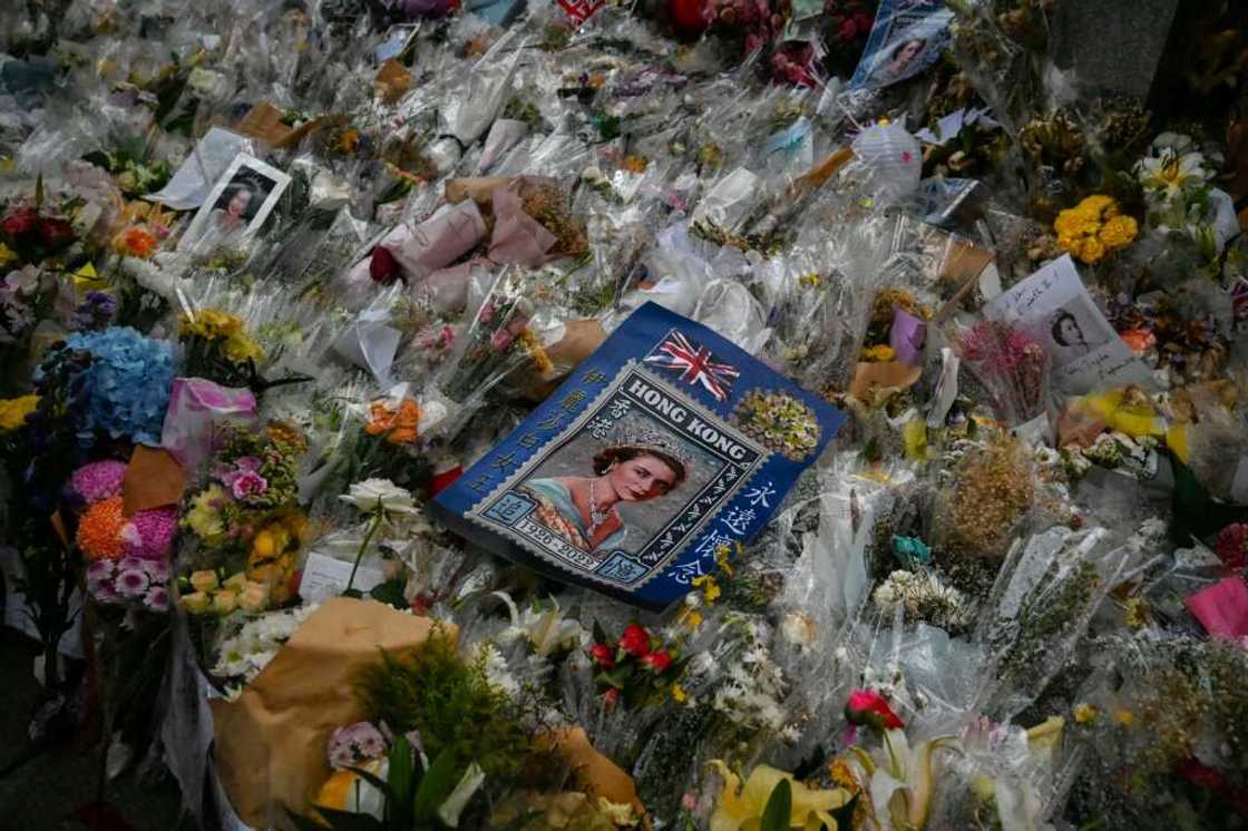 Hong Kongers have left a field of bouquets outside the British consulate