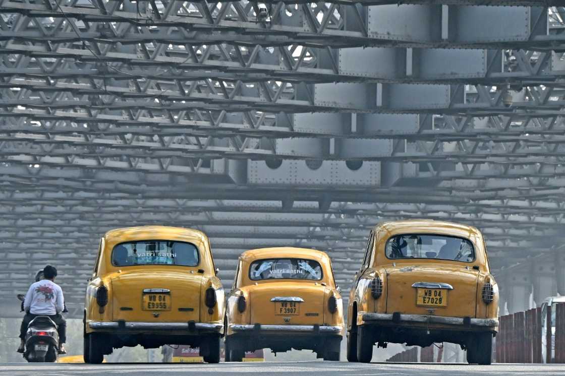 Kolkata's fleet of snub-nosed yellow taxis are a readily recognisable symbol of the city's identity Kolkata's fleet of snub-nosed yellow taxis are a readily recognisable symbol of the city's identity