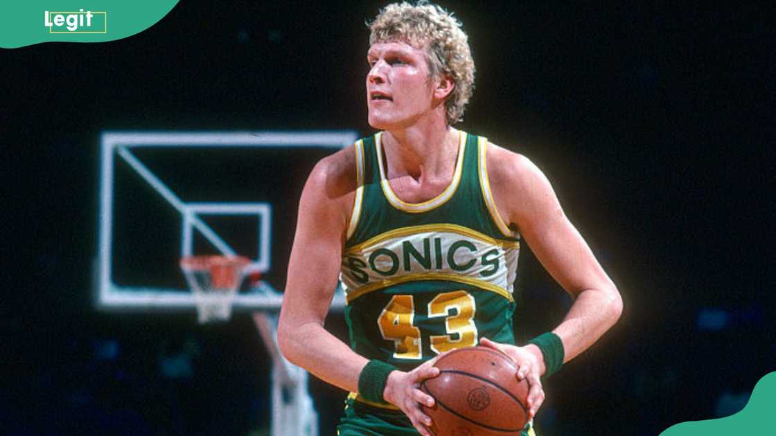 Jack Sikma looks to pass the ball against the Washington Bullets Jack Sikma looks to pass the ball against the Washington Bullets
