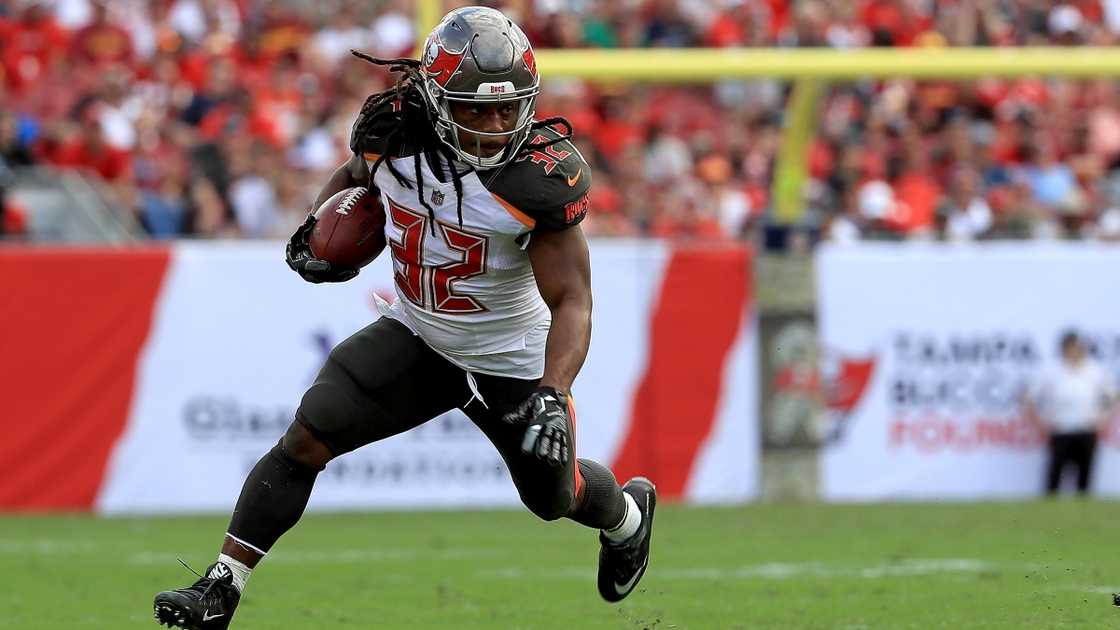Jacquizz Rodgers of the Tampa Bay Buccaneers rushes during a game Jacquizz Rodgers of the Tampa Bay Buccaneers rushes during a game