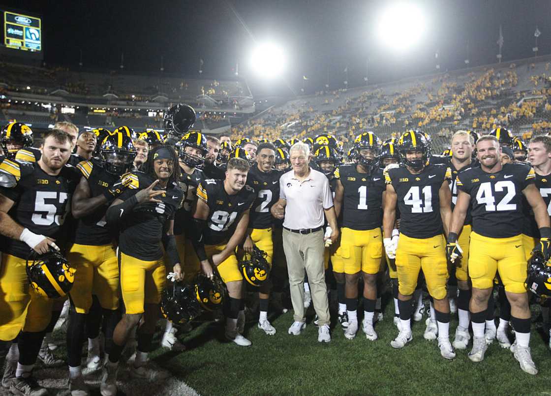 Iowa Hawkeyes footballl team and their head coach Kirk Ferentz