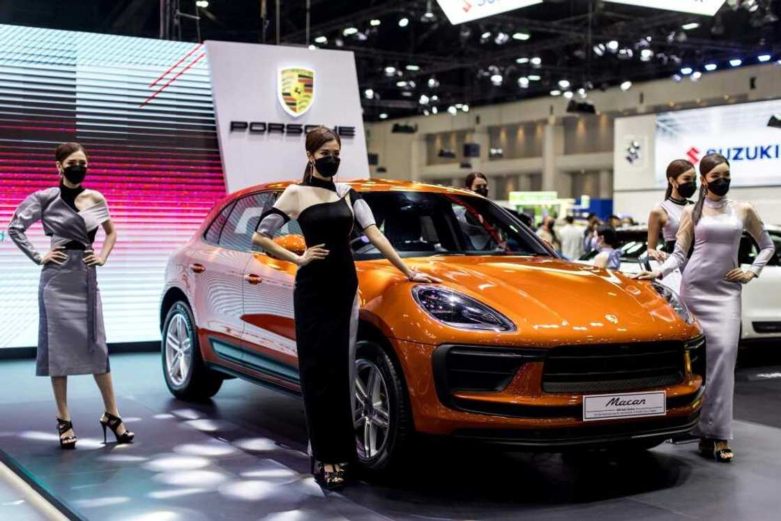 The mega IPO comes as Porsche beefs up its electric ambitions with an electric version of the Macan, seen here at the Thailand International Motor Expo, due in 2024 The mega IPO comes as Porsche beefs up its electric ambitions with an electric version of the Macan, seen here at the Thailand International Motor Expo, due in 2024