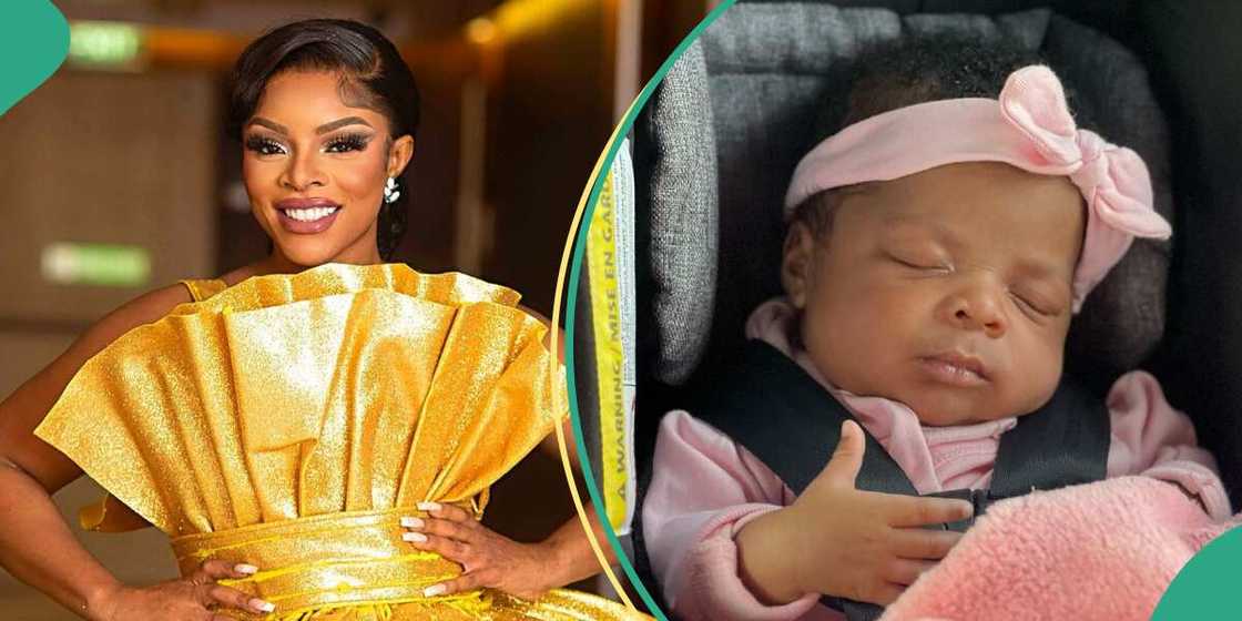 Laura Ikeji shows off her tattoo and baby's face.