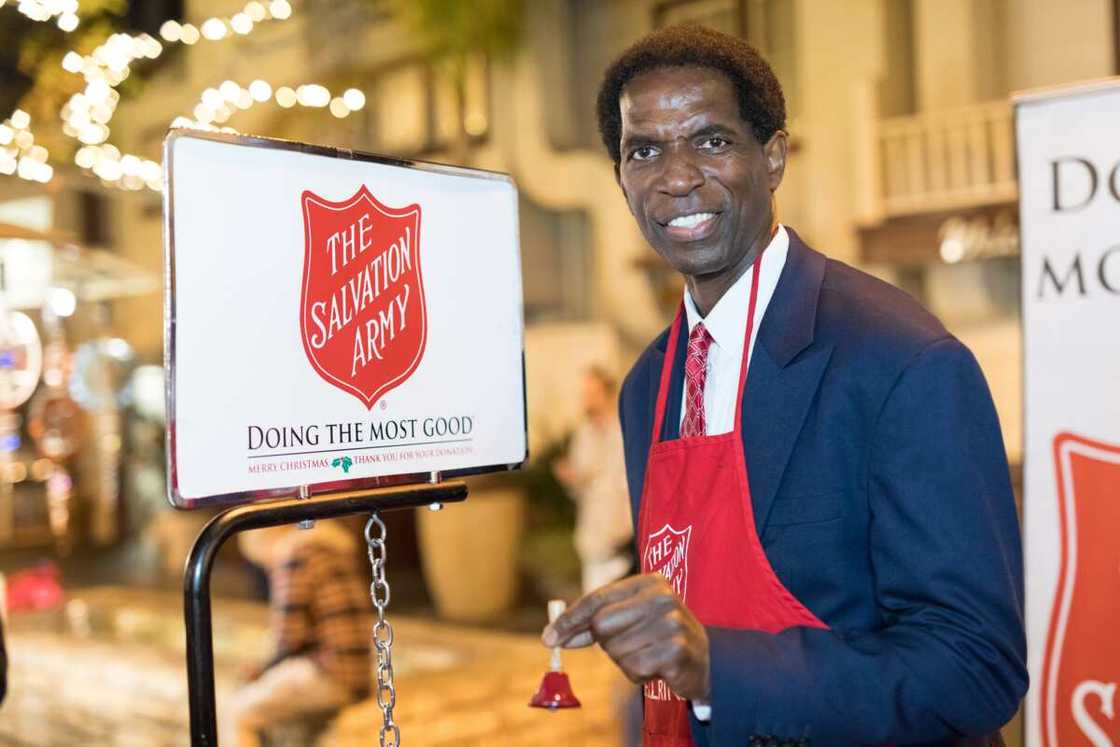 Former NBA Player A.C. Green rings the bell at The Salvation Army Celebrity Kettle Kickoff - Red Kettle Hollywood Former NBA Player A.C. Green rings the bell at The Salvation Army Celebrity Kettle Kickoff - Red Kettle Hollywood