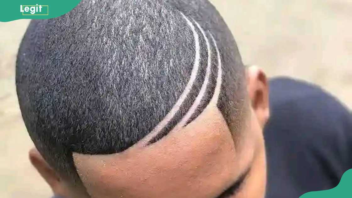 High fade with dramatic cuts hairstyle for men High fade with dramatic cuts hairstyle for men