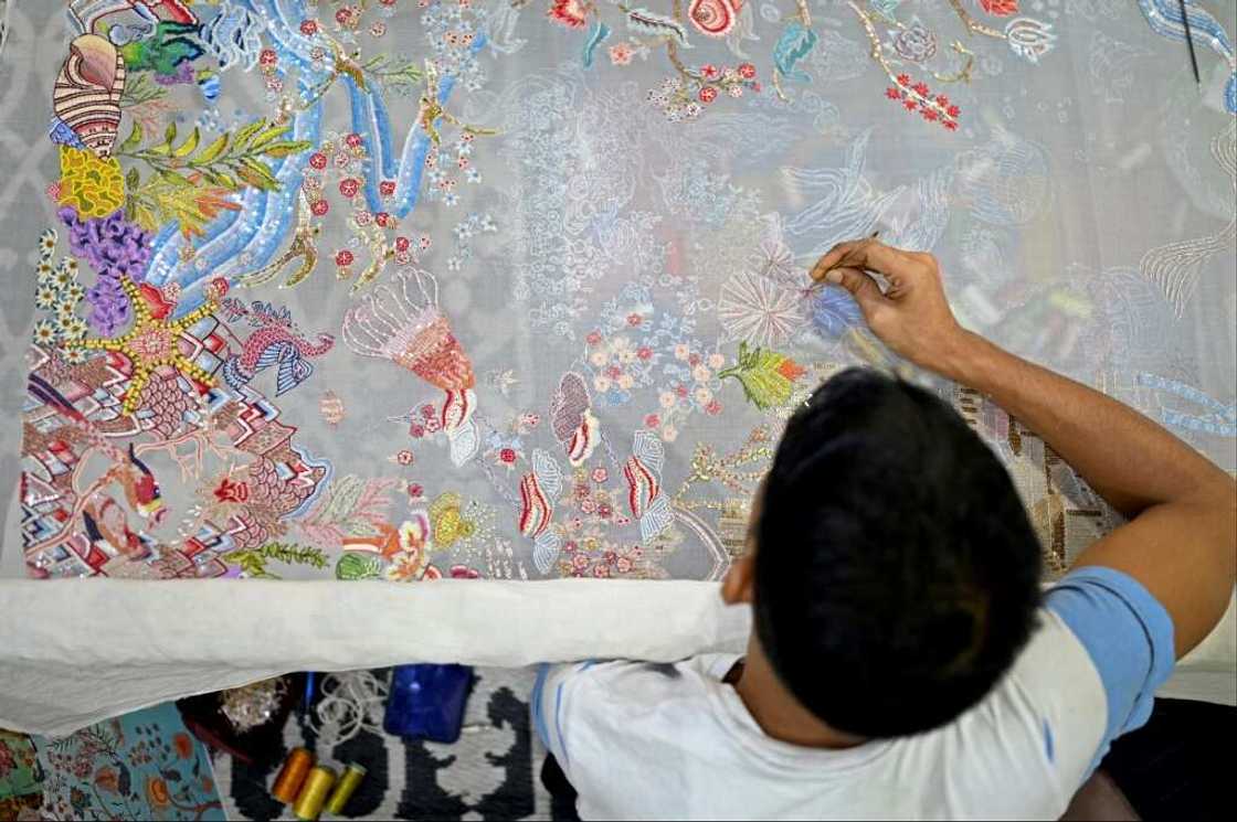 Intricate, tactile detail is a hallmark of Rahul Mishra's fashion, as seen at his workshop in Noida, India, near New Delhi Intricate, tactile detail is a hallmark of Rahul Mishra's fashion, as seen at his workshop in Noida, India, near New Delhi