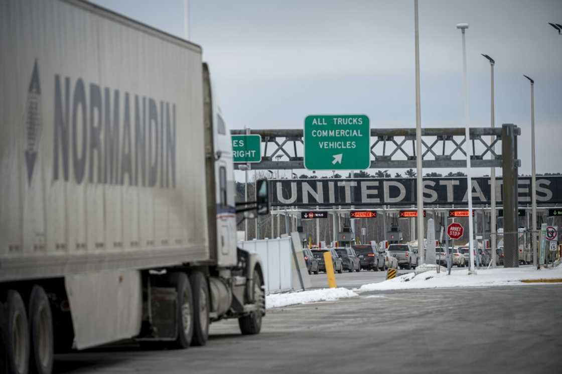 A truck prepares to enter the United States at a border crossing in Blackpool, Canada, a country which has vowed to hit back if Washington goes ahead with 25 percent tariffs on Canadian imports