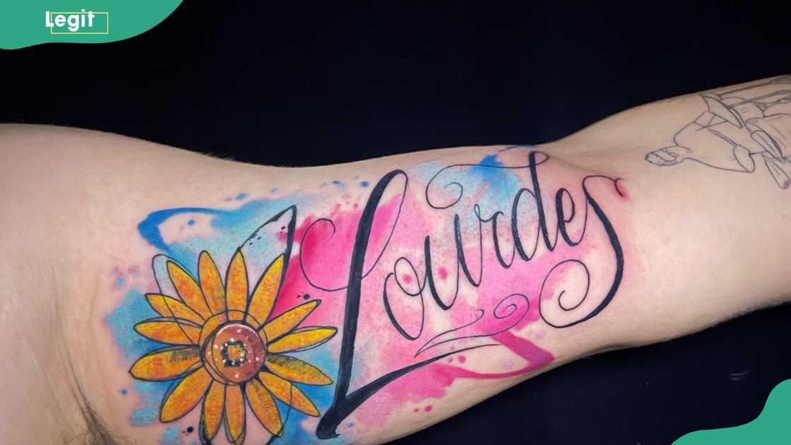 Watercolour name tattoo