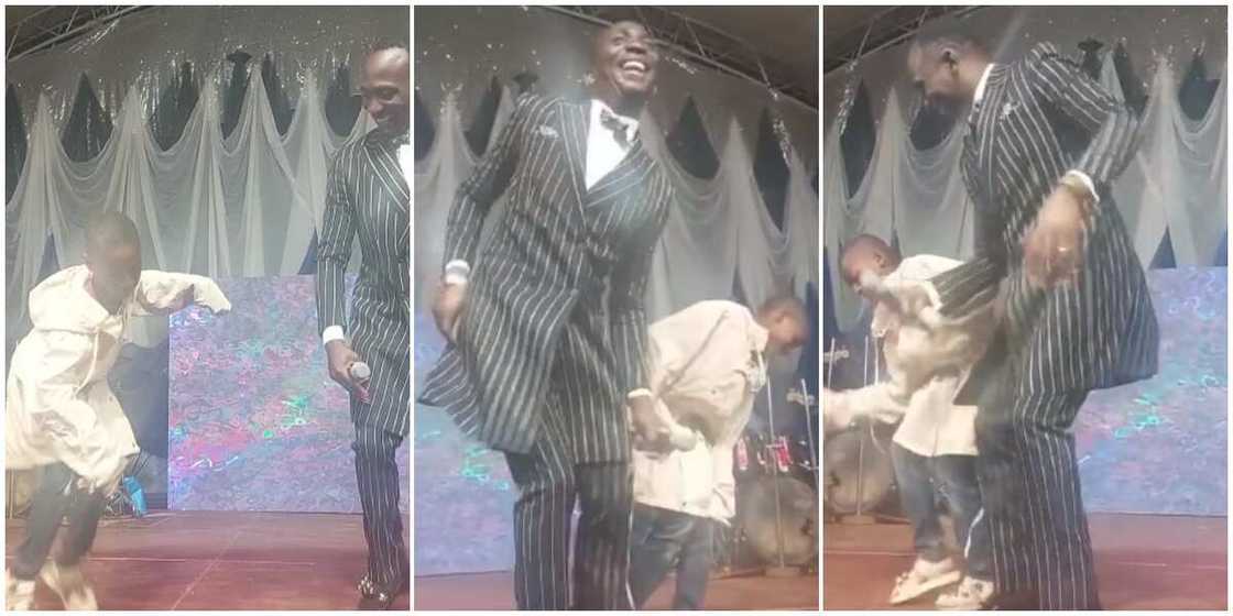 Pastor Paul Enenche left impressed as little boy stuns him with fast legworks on altar as they danced, video wows many Pastor Paul Enenche left impressed as little boy stuns him with fast legworks on altar as they danced, video wows many