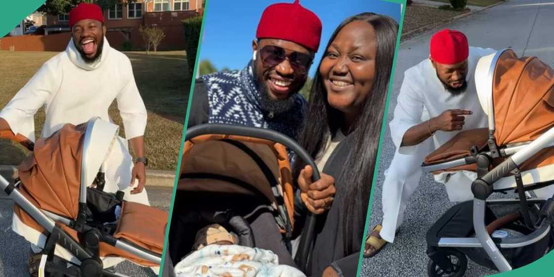 Stan Nze, his wife and newborn baby on the streets of Atlanta