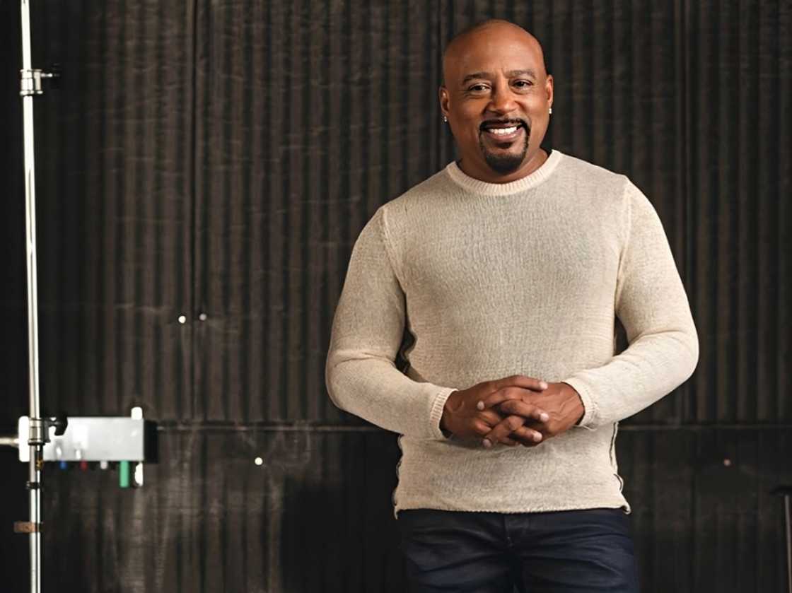 Daymond John poses for a magazine cover Daymond John poses for a magazine cover