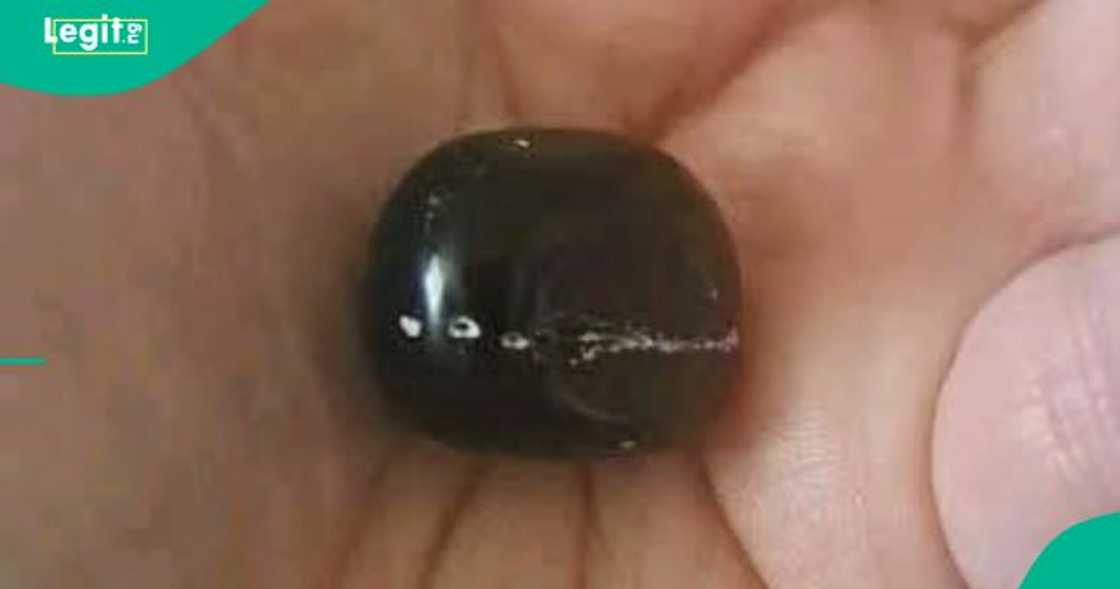 Man speaks about black stone, claims it's a potent poison extractor. Man speaks about black stone, claims it's a potent poison extractor.