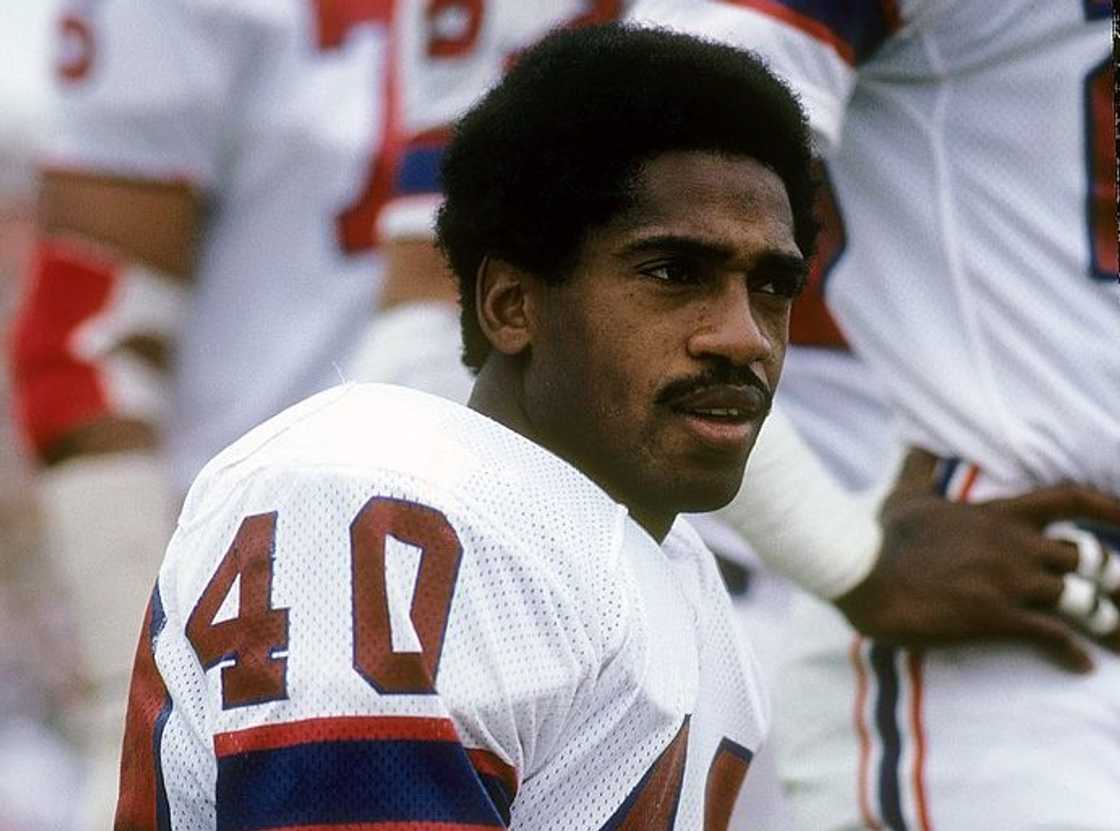 Mike Haynes #40 looks on before an NFL football game at Foxboro Stadium Mike Haynes #40 looks on before an NFL football game at Foxboro Stadium