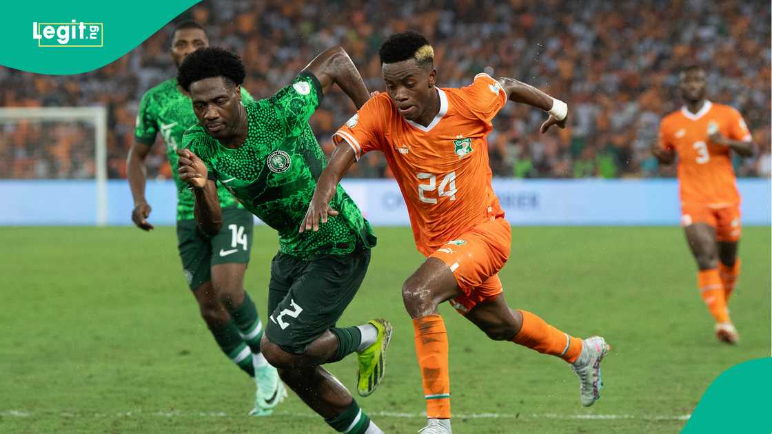 Ola Aina tackles Simon Adingra