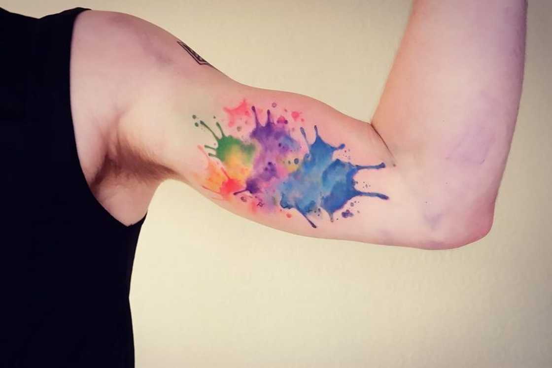 Watercolour splash tattoo