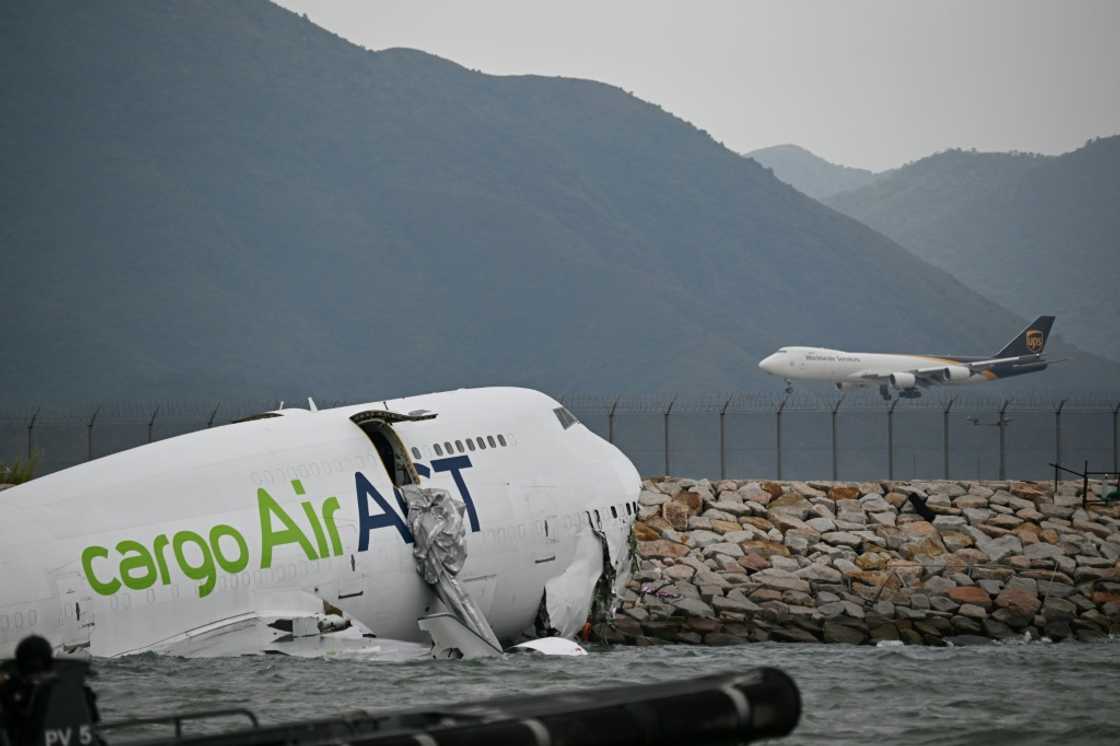 Authorities will investigate why a cargo plane veered off a runway in Hong Kong Authorities will investigate why a cargo plane veered off a runway in Hong Kong