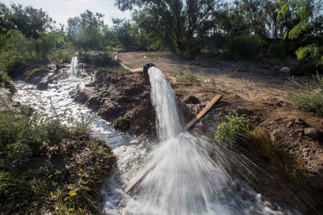 Water is pumped out of a flooded Mexican coal mine where 10 workers are trapped