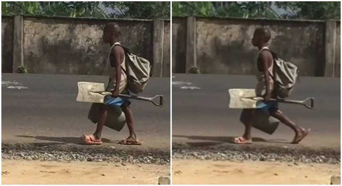 Young Nigerian boy seen with work tools. Young Nigerian boy seen with work tools.