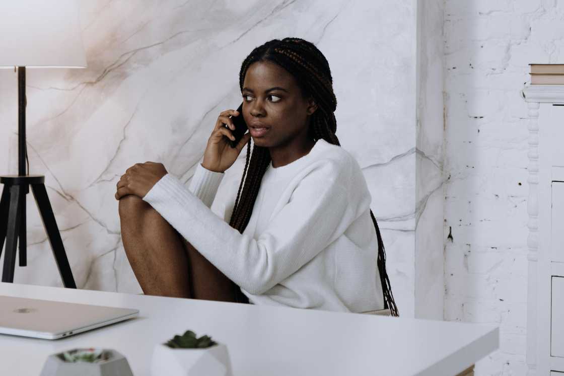 A woman in a white dress shirt