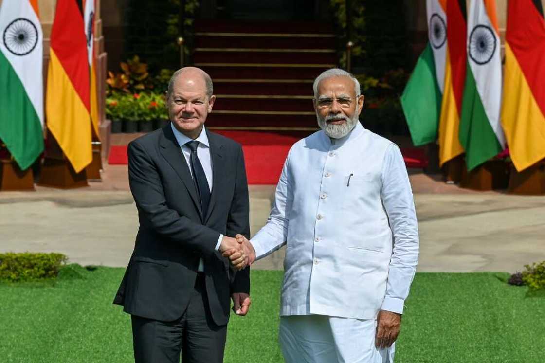 Officials said German Chancellor Olaf Scholz (L, with Prime Minister Narendra Modi) would press for progress towards a trade deal between the EU and India Officials said German Chancellor Olaf Scholz (L, with Prime Minister Narendra Modi) would press for progress towards a trade deal between the EU and India