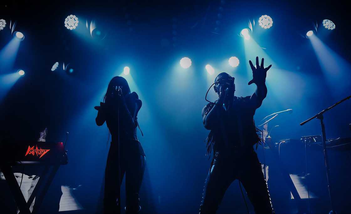 Kat Von D and Leafar Seyer gesture while performing