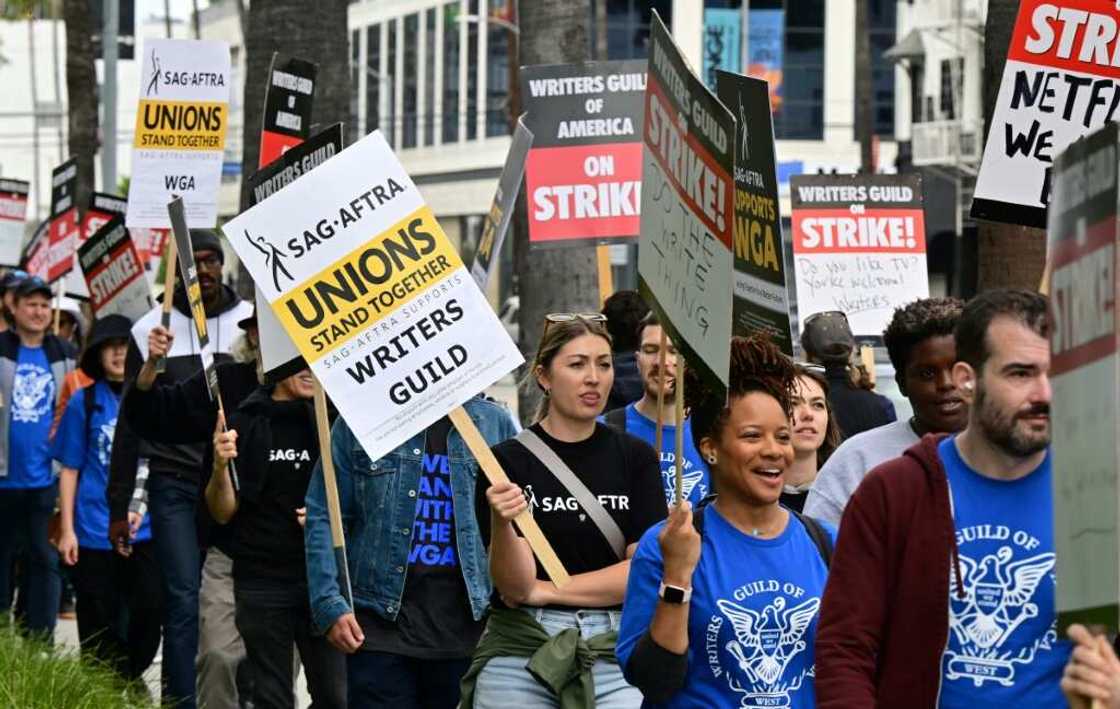 Writers march on the fourth day of the strike by the Writers Guild of America, protesting in front of the offices of Netflix in Hollywood, California, May 5, 2023