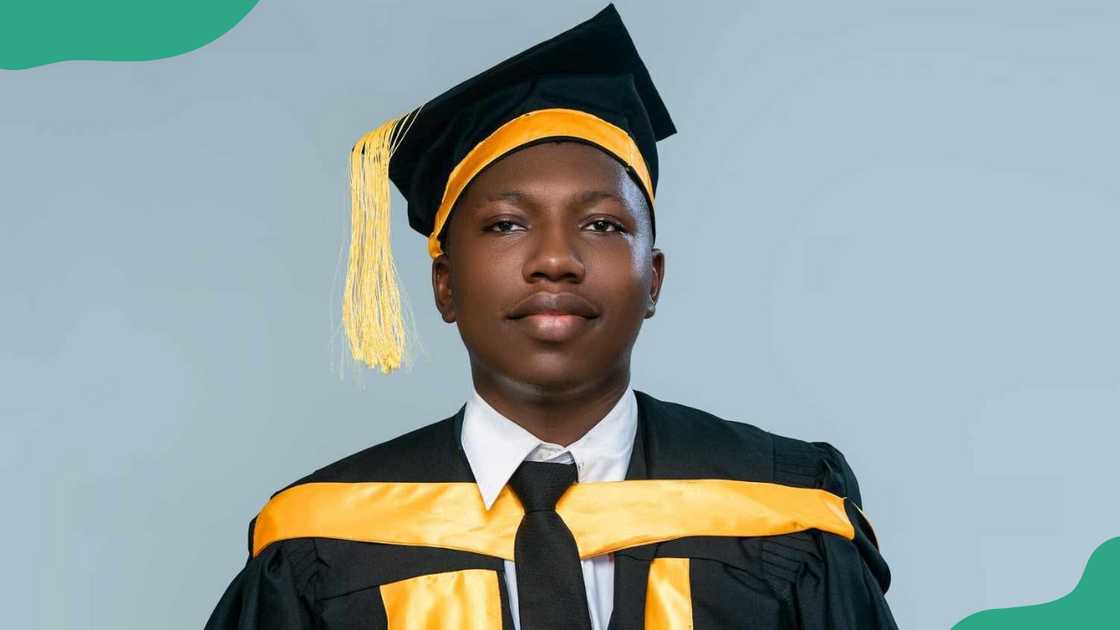 A UNIZIK student in graduation gown. A UNIZIK student in graduation gown.