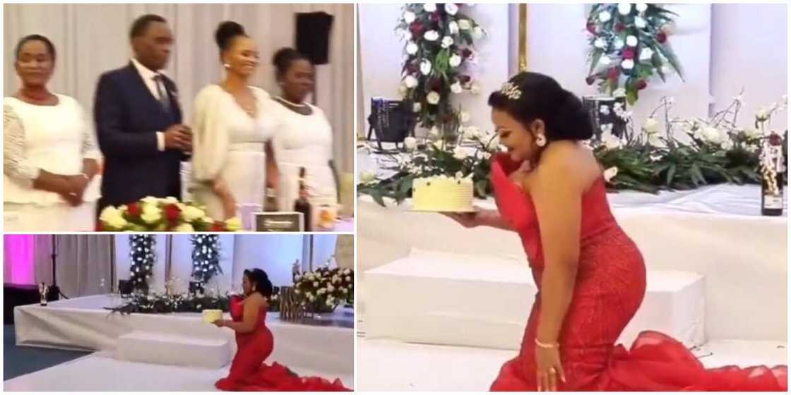 Reactions as 'bride' is made to knee-walk with cake in hand at wedding in trending video