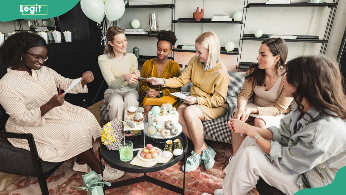 Ladies playing baby shower games Ladies playing baby shower games