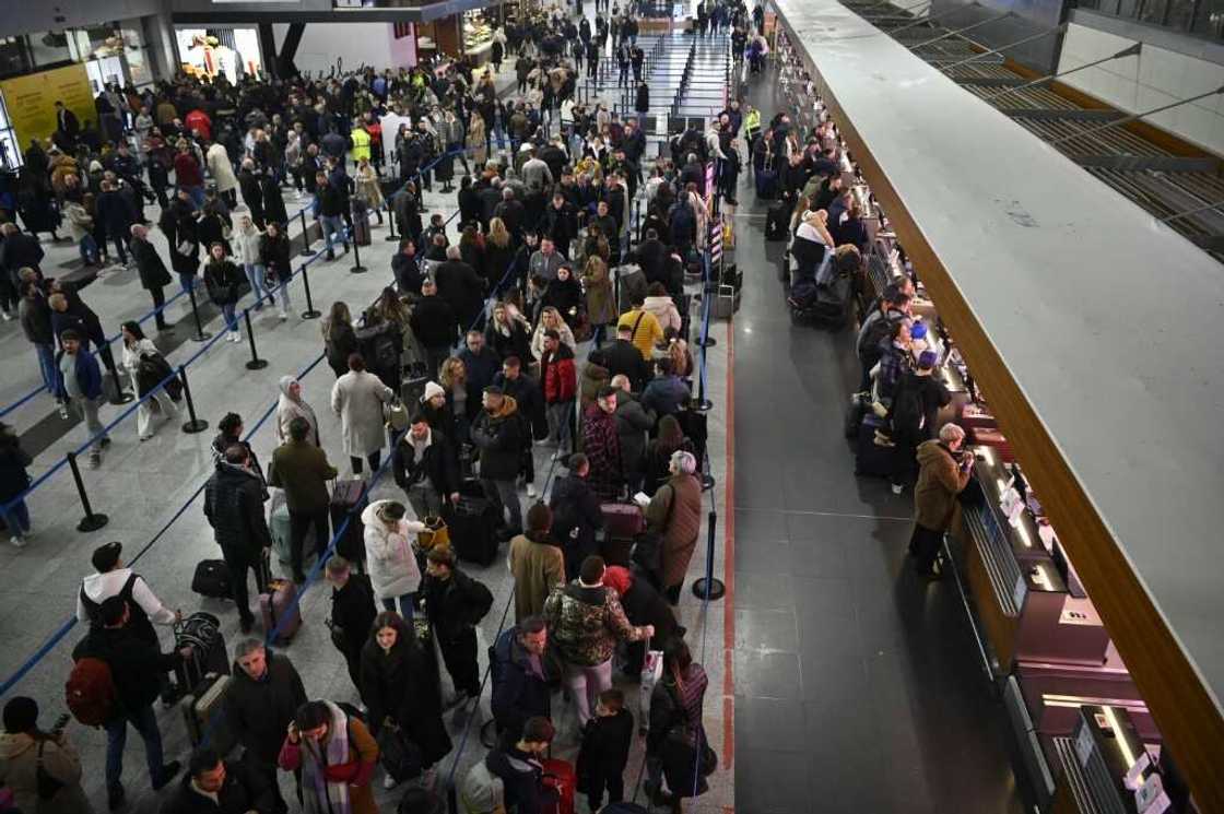 Travellers queue up at Pristina International Airport after a new EU visa scheme came into force allowing Kosovars to travel to Europe's border less zone without a visa Travellers queue up at Pristina International Airport after a new EU visa scheme came into force allowing Kosovars to travel to Europe's border less zone without a visa