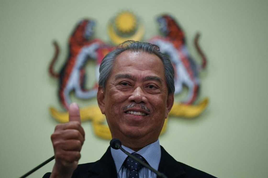 Former premier Muhyiddin Yassin, seen here in 2020, and opposition leader Anwar Ibrahim both claim they have the numbers to form a coalition government in Malaysia Former premier Muhyiddin Yassin, seen here in 2020, and opposition leader Anwar Ibrahim both claim they have the numbers to form a coalition government in Malaysia