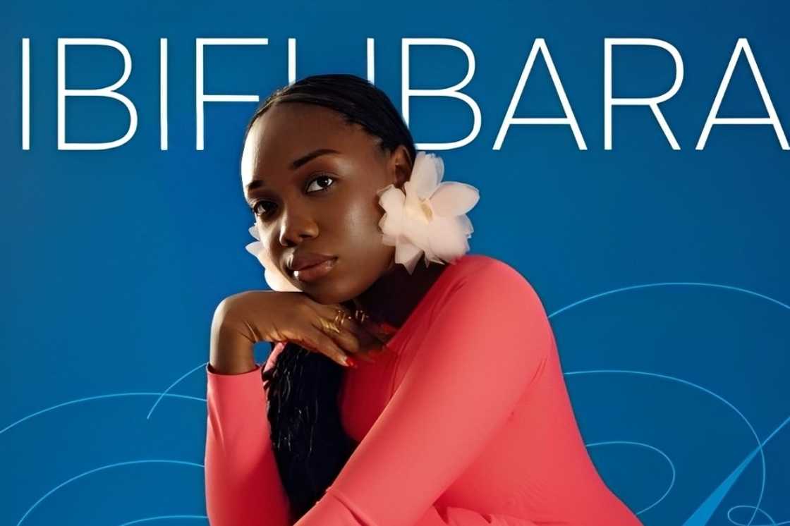 Ibifubara from BBNaija posing in a red dress
