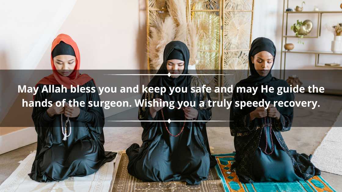 A group of women in hijabs are kneeling in prayer