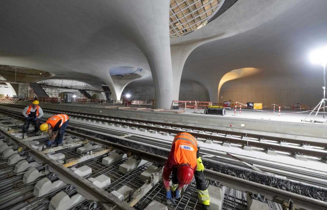 Workers at the new underground main station in the Stuttgart 21 project Workers at the new underground main station in the Stuttgart 21 project