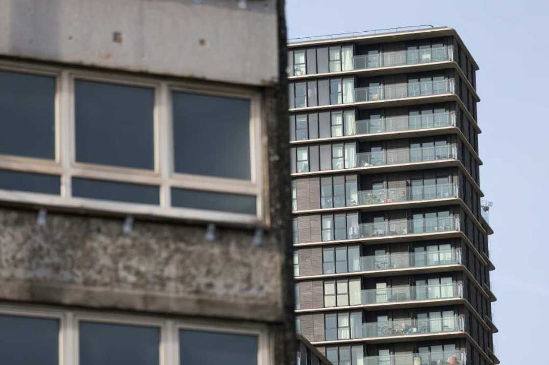 A crumbling housing estate in Stratford next to the gleaming luxury apartments of Olympic Park A crumbling housing estate in Stratford next to the gleaming luxury apartments of Olympic Park