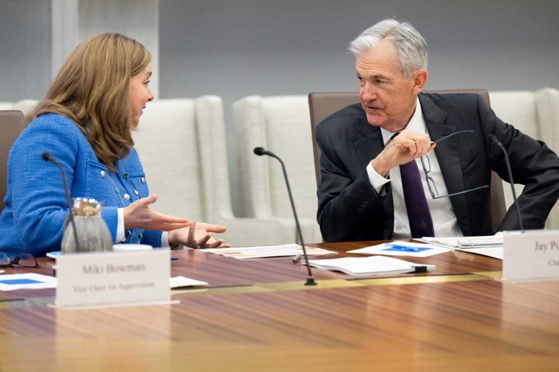 Chairman of the US Federal Reserve Jerome Powell speaks with Fed vice chair for supervision Michelle Bowman (L), as he chairs a Federal Reserve Board open meeting Chairman of the US Federal Reserve Jerome Powell speaks with Fed vice chair for supervision Michelle Bowman (L), as he chairs a Federal Reserve Board open meeting