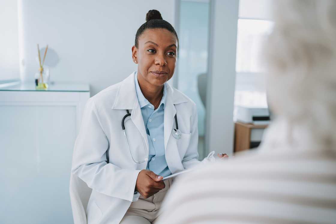 A doctor talking to a patient