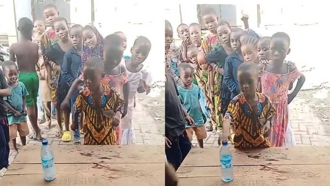 Photo of young boy flipping bottle Photo of young boy flipping bottle