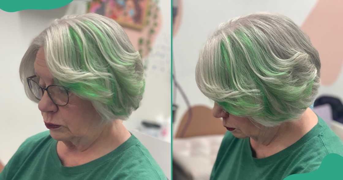 A senior woman with a short dyed bob poses sitting.