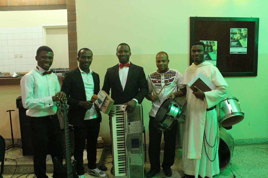 Dominican University Ibadan students posing for a representation   with philharmonic  instruments