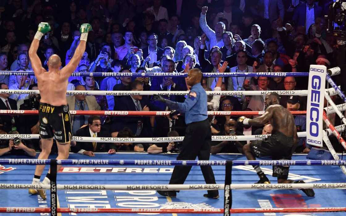 Deontay Wilder and Fury. Deontay Wilder and Fury.